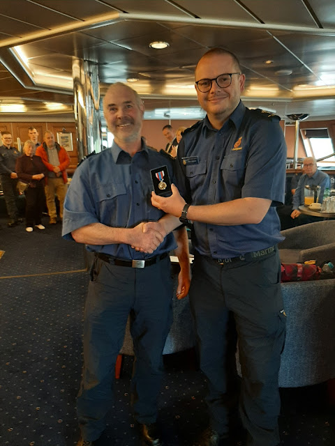 Shetland MRCC took the opportunity to award long-service awards to their team during the CG200 celebrations.  Coastguard Chaplain Tom (right) was on hand to help.
