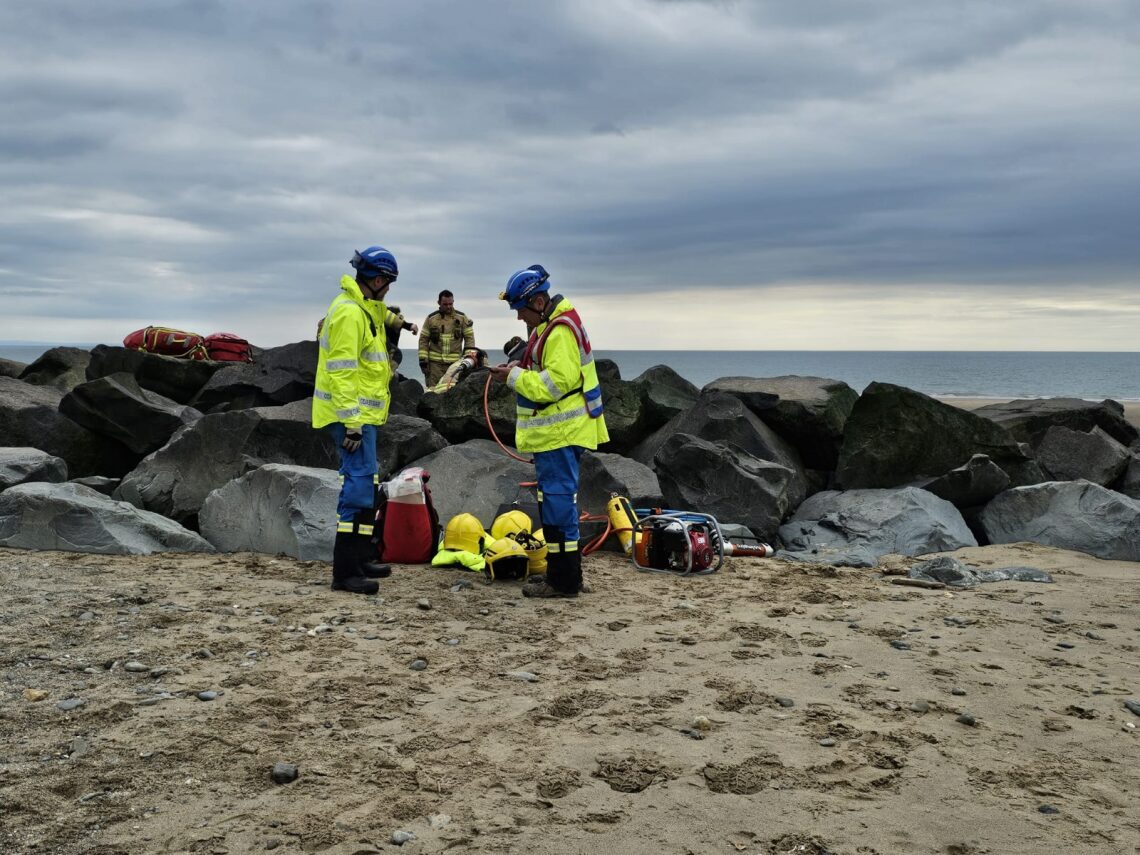 Two coastguards at the Tywyn beach rock rescue 