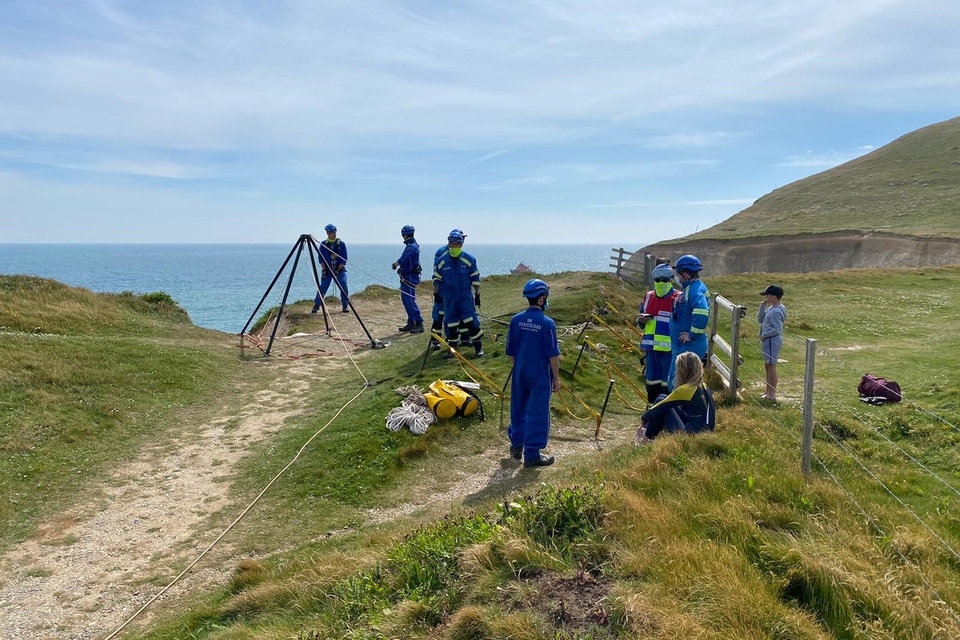 The Needles and Ventnor Coastguard Rescue Teams carried out a 'complex' rope rescue to bring the family to the top of the cliff from the beach below