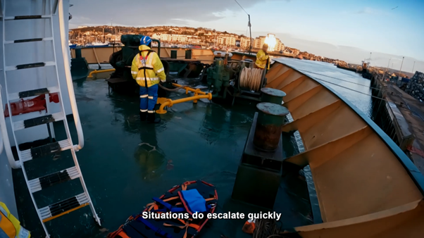 Coastguard officer on a ship with 'things escalate quickly' written on the screen