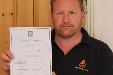 Rob Thurkettle with his Certificate of Recognition