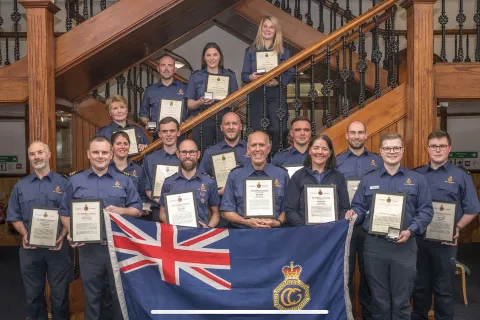 Proud members of the Lerwick, Walls and Sumburgh coastguard rescue teams with their certificates       Image credit: Brian D Gray