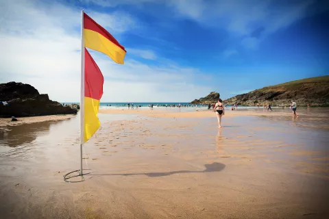 Lifeguarded beach with flags
