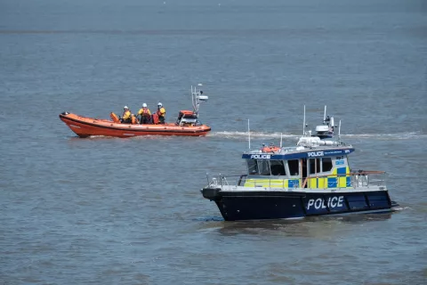 RNLI and police boat on the River Thames