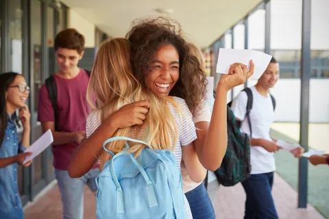 Girls celebrate their exam results