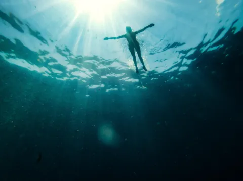 Stock image of a woman following float to live advice