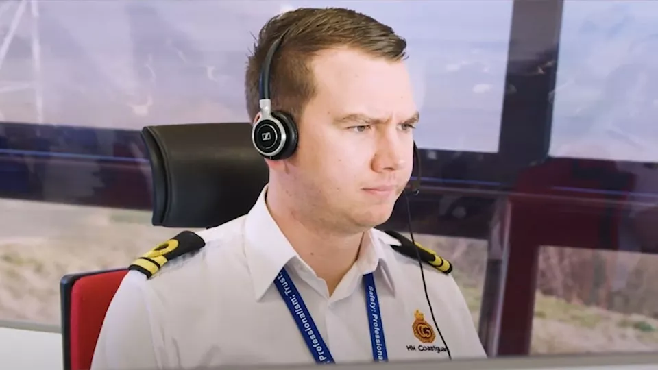 A Maritime Operations Officer working in the HM Coastguard Operations Room