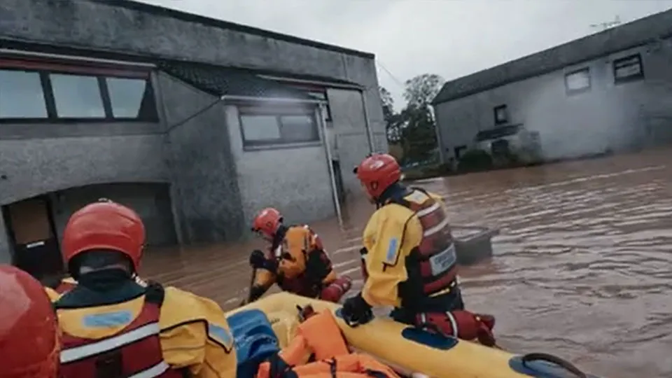 Coastguard rescue officers in a flood