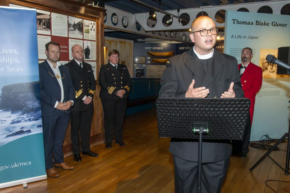 Coastguard Chaplain Tom Ebbens speaking at the celebration.