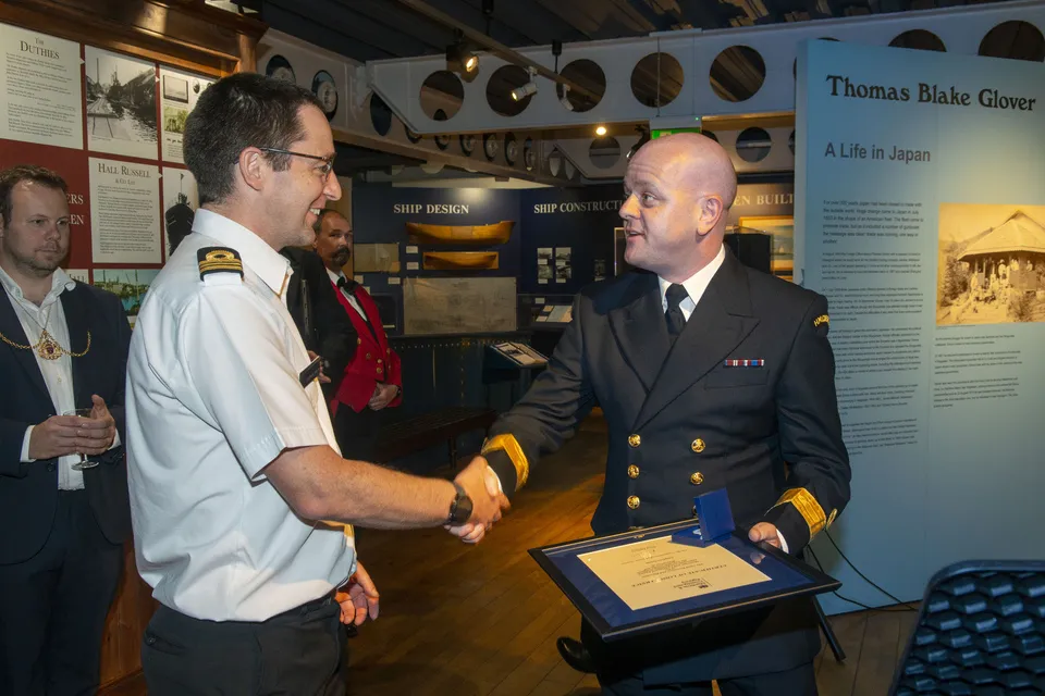 Stephen Smith receiving a long service award.