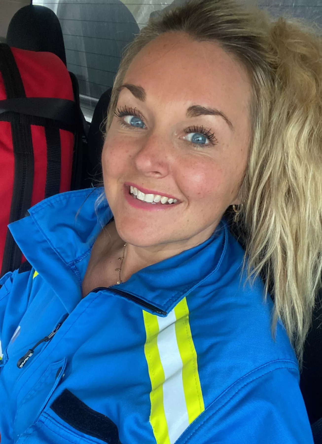 Selfie of Jennifer Moore in Coastguard blue coveralls