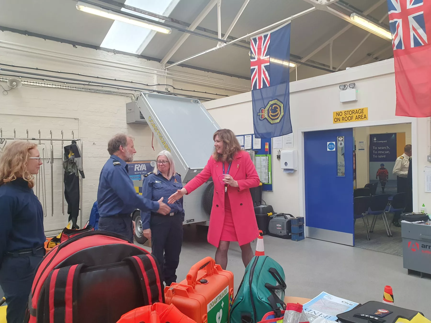 Virginia McVea, CEO of Maritime and Coastguard Agency, with HM Coastguard volunteers in Greenock.