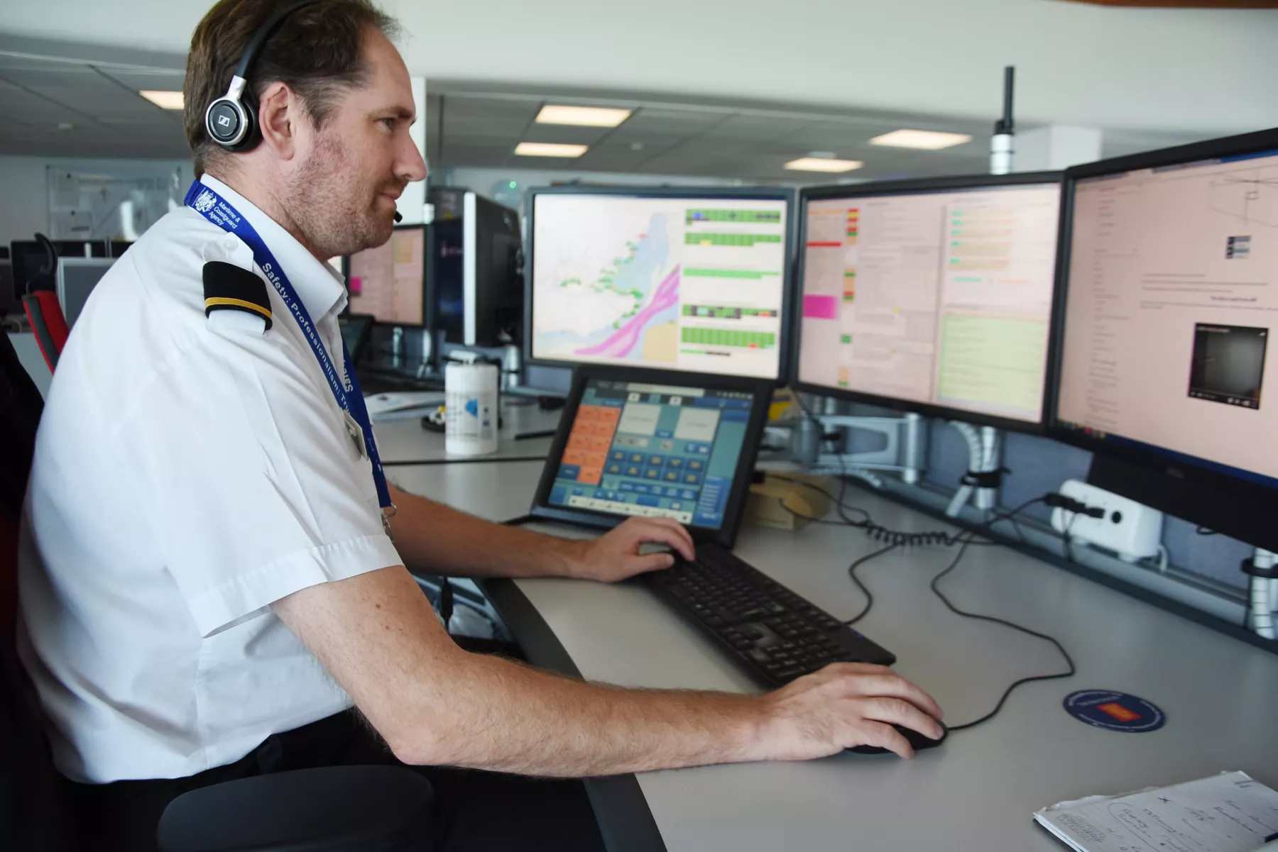 A Vessel Traffic Service Operator working at the Coastguard Operations Centre in Dover.
