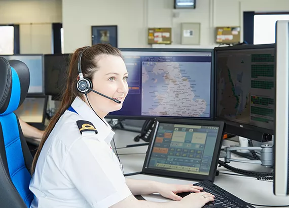 Chloe on call in an ops room