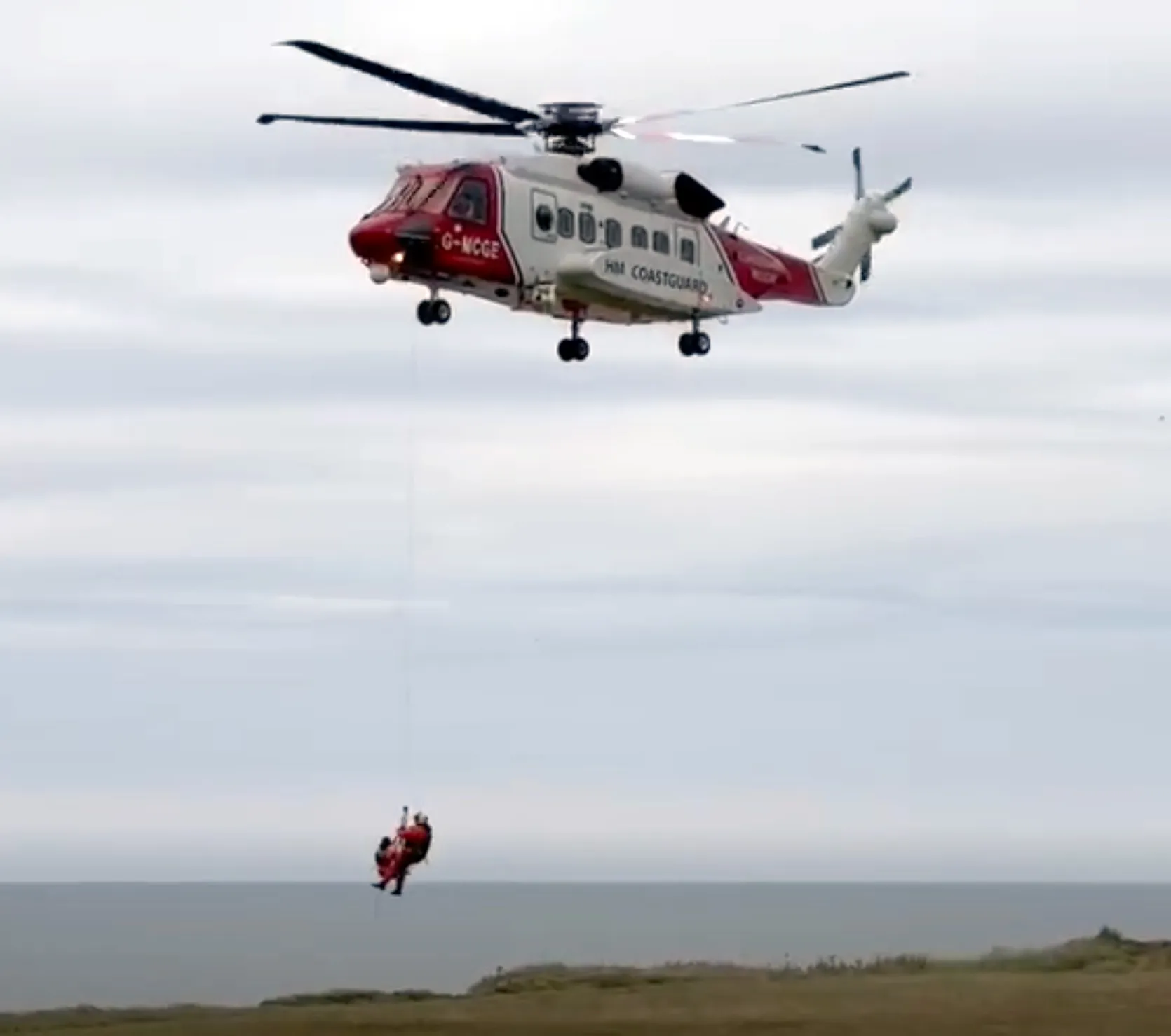 HM Coastguard responds to two paddleboarders stranded near Flamborough Head, Yorkshire.