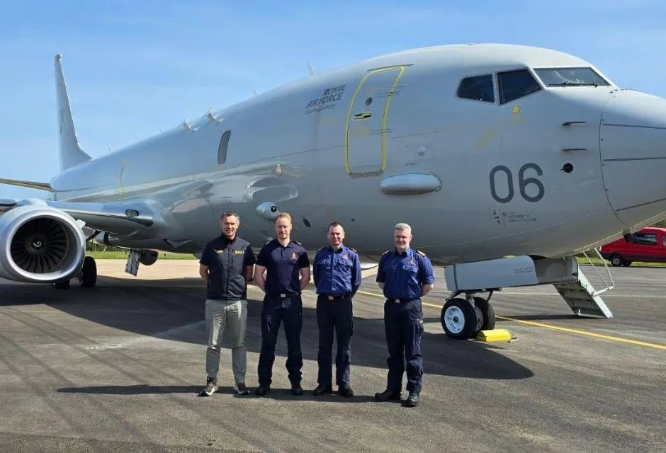 Standing in front of an RAF P8 Poseidon aircraft are, from left, Phillip Johnston, RNLI Area Operations Manager; Andrew Oldfield, Rescue Coordination Centre Manager, Belfast; Ryan Gray, Senior Coastal Operations Officer; Gordon McCreadie, Divisional Commander