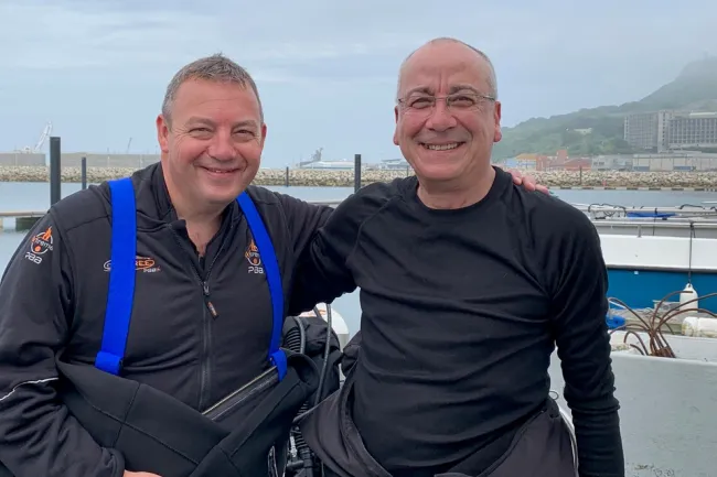 Mark (left) and dive instructor Izzy remain firm friends. Image courtesy of Mark Ninnim
