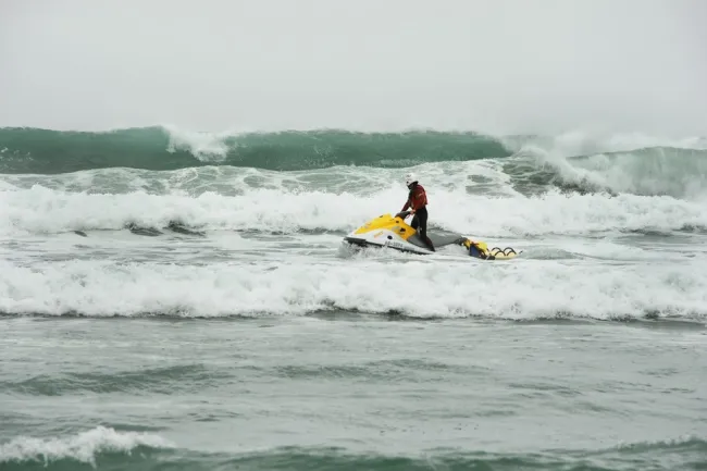 Lifeguards in surf