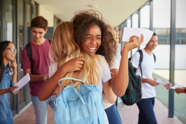 Girls celebrate their exam results