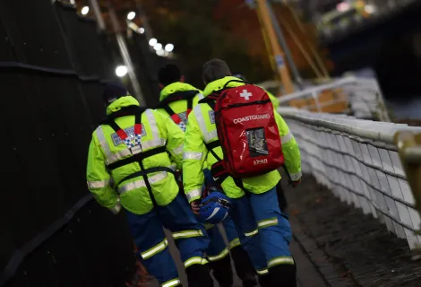 HM Coastguard rescue team walking along the Clyde Waterfront ahead of COP26