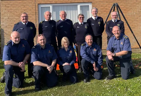NCI volunteers and members of HM Coastguard outside the Bembridge station they trialed sharing.