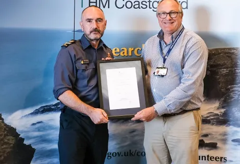 Alan Stewart receiving his award from Brian Johnson CEO
