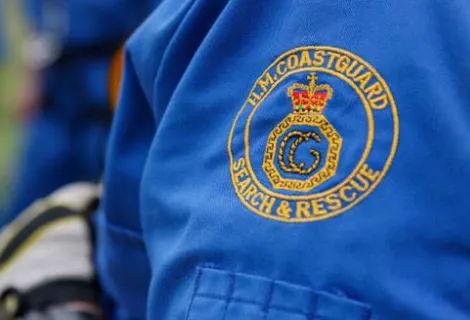 The HM Coastguard crest.