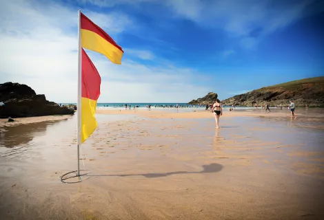 Lifeguarded beach with flags