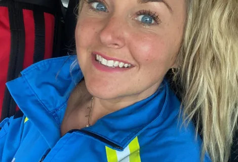 Selfie of Jennifer Moore in Coastguard blue coveralls
