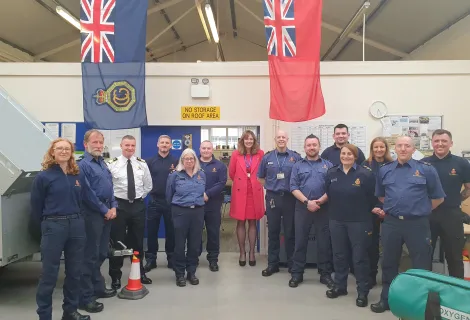 Virginia McVea, CEO of Maritime and Coastguard Agency, with HM Coastguard volunteers in Greenock.