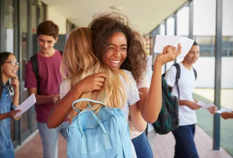 Girls celebrate their exam results