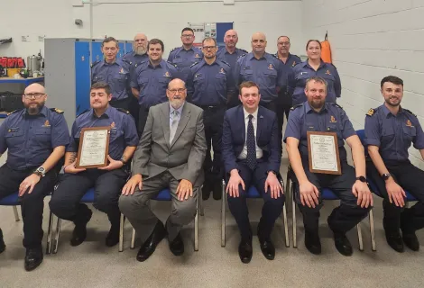 Blythe Coastguard Rescue Team with, front row: Coastal Operations Area Commander Martin Lowe; Scott Reed; Jon Wright and Peter Liley from Tynemouth Medal Trust; Sean Robinson and Ryan Douglas