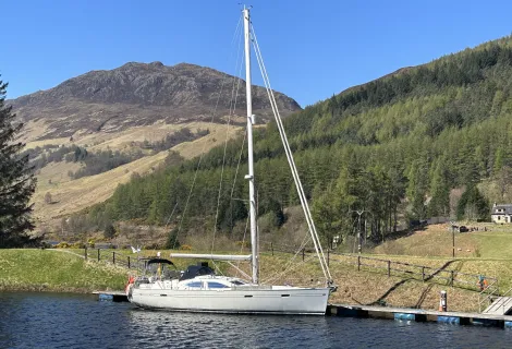 Anthony Purcell's yacht Triple D moored with a mountain in the background