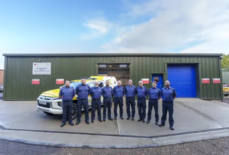 Needles Coastguard Rescue Team standing outside their new station