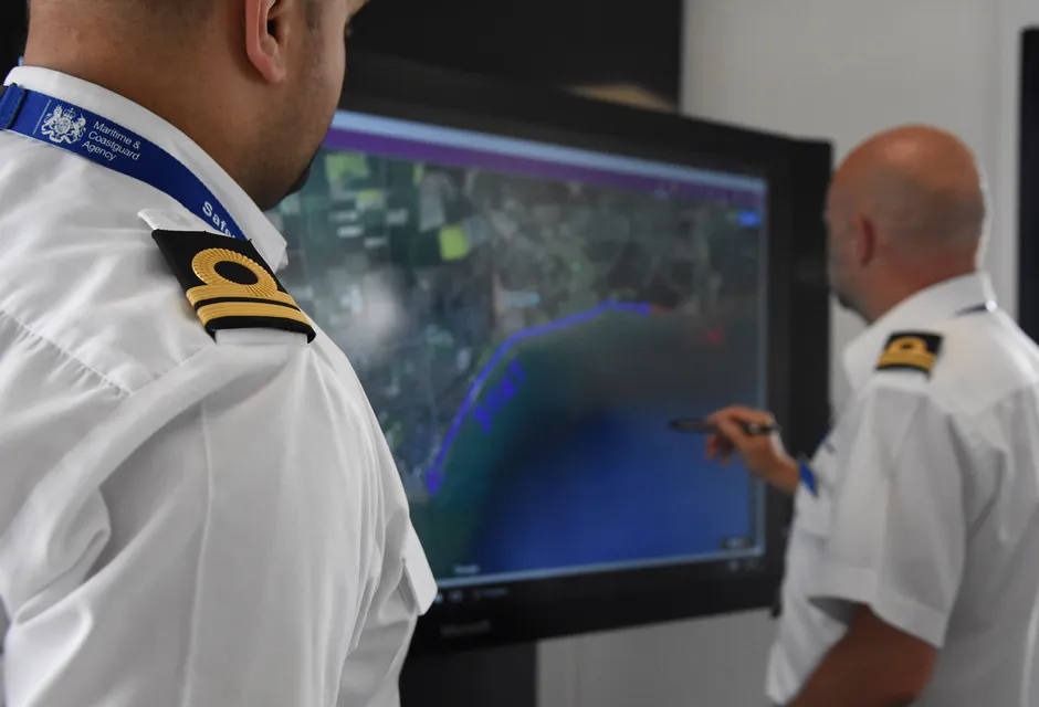 Coastguard officers co-ordinating a response to an incident.