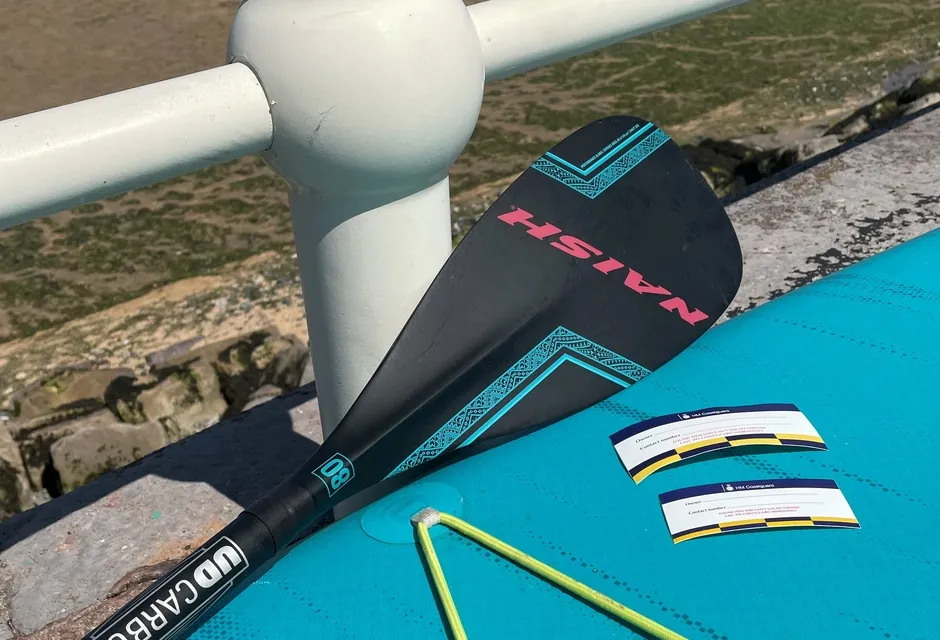 Waterproof labels on a stand-up paddleboard
