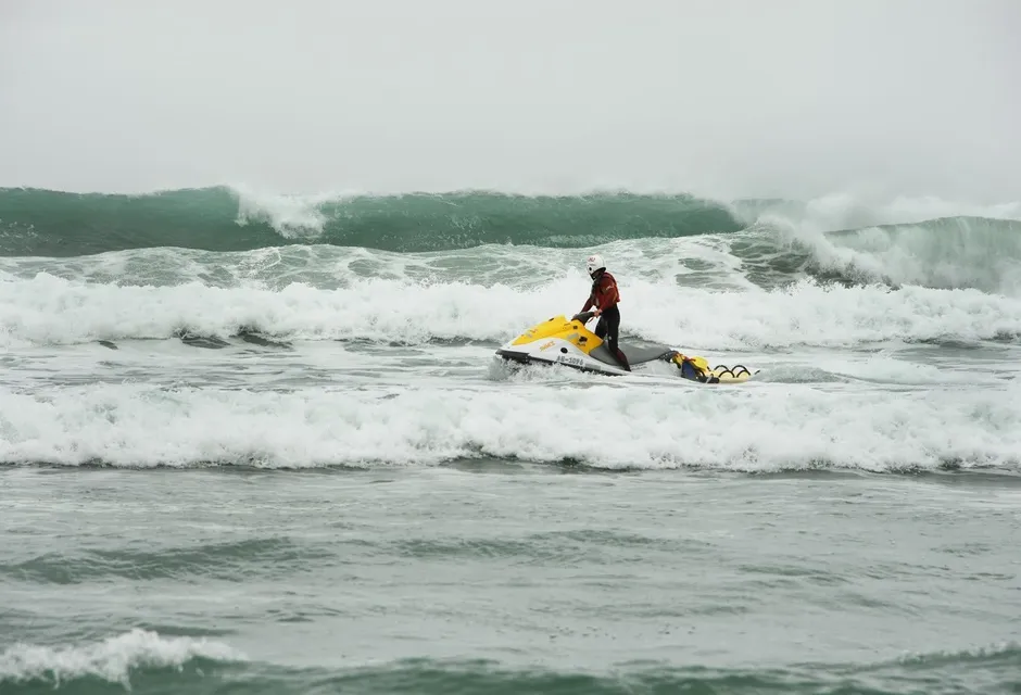 Lifeguards in surf
