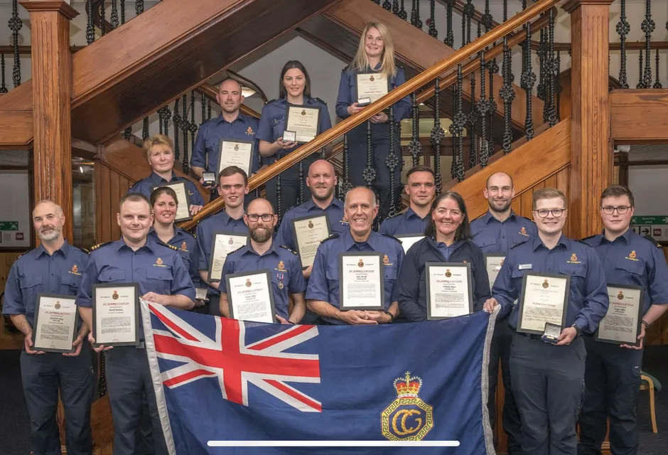 Proud members of the Lerwick, Walls and Sumburgh coastguard rescue teams with their certificates       Image credit: Brian D Gray