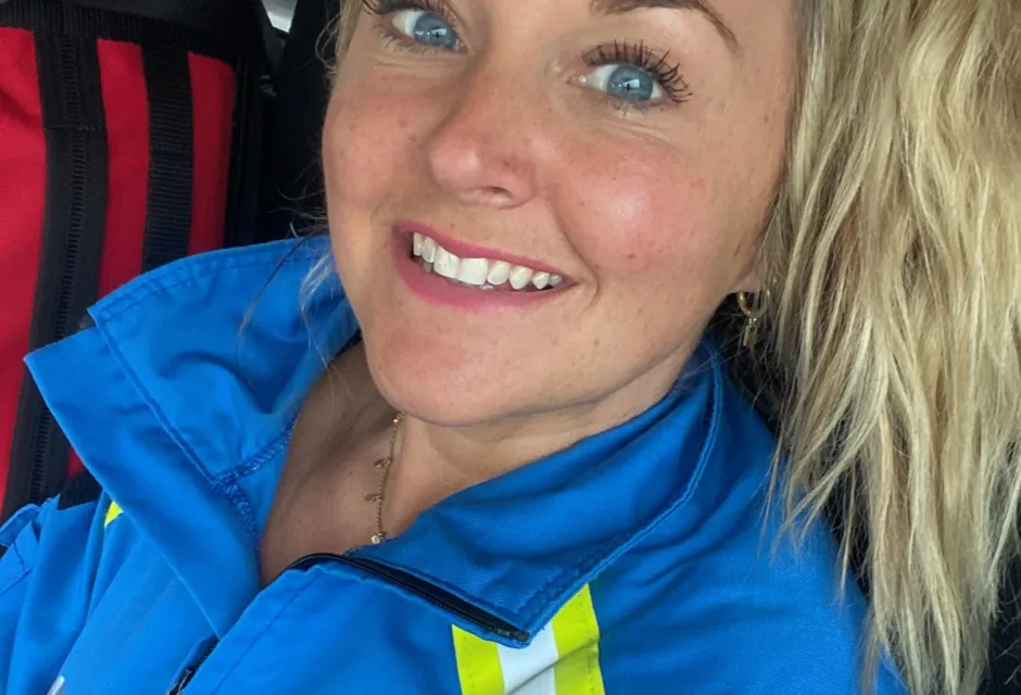 Selfie of Jennifer Moore in Coastguard blue coveralls