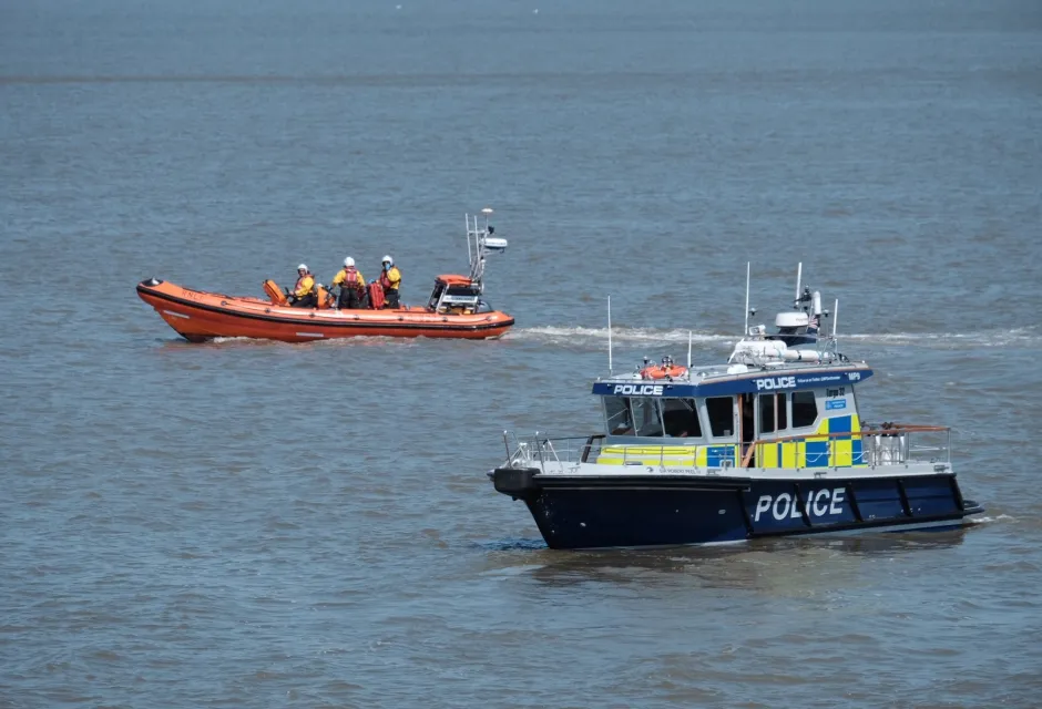 RNLI and police boat on the River Thames
