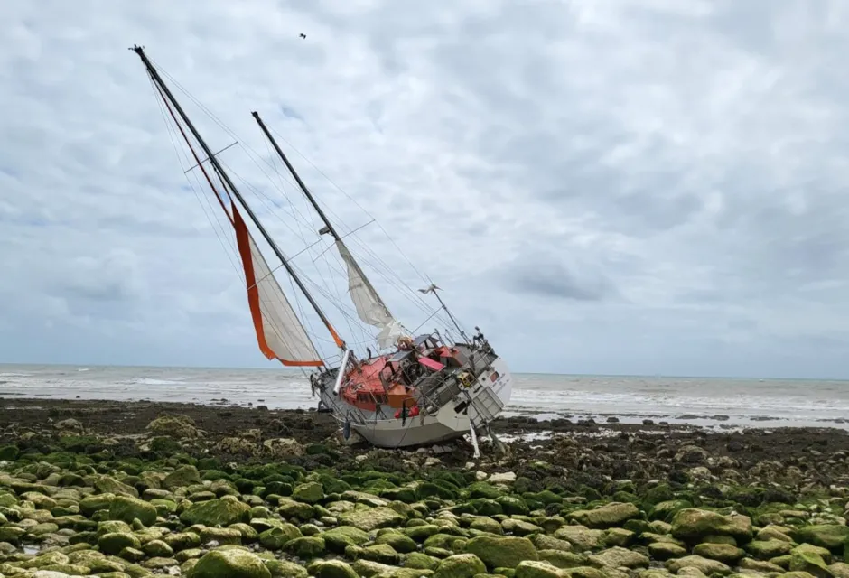 Vessel aground on chalky beach