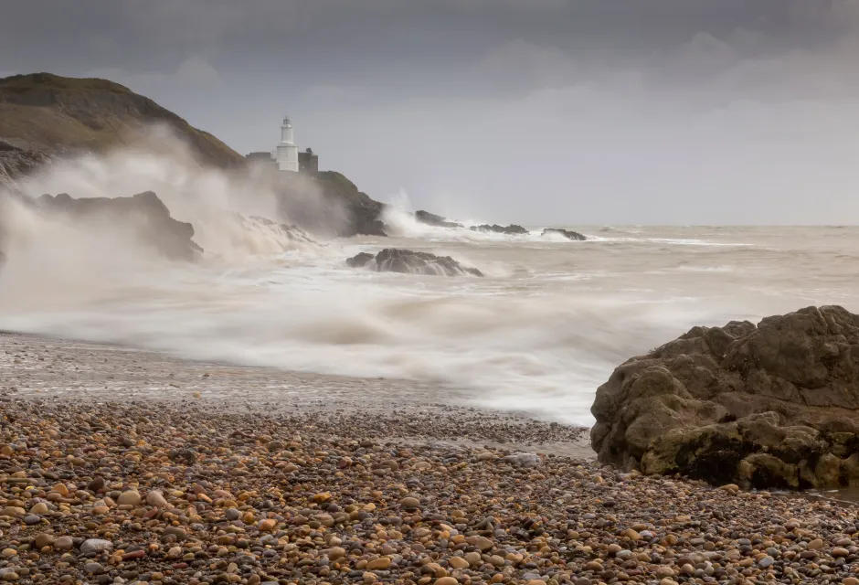 Stormy waves and spray hit cliff on UK coast