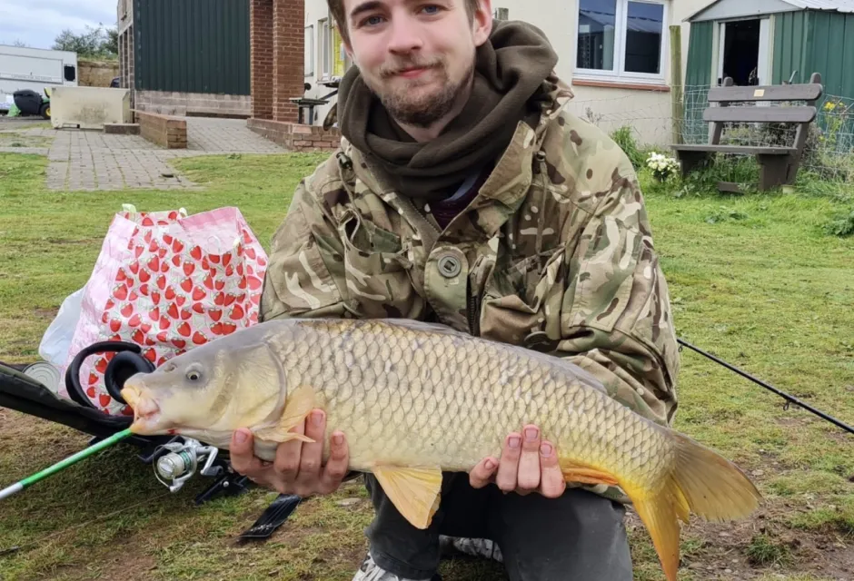 Tom Thorburn pictured with a large fish held in both hands
