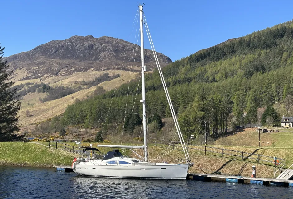 Anthony Purcell's yacht Triple D moored with a mountain in the background