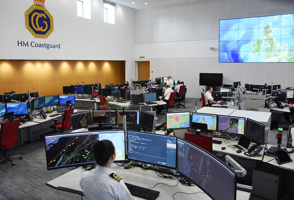 The operations room at the Joint Rescue Coordination Centre, with desks and screens
