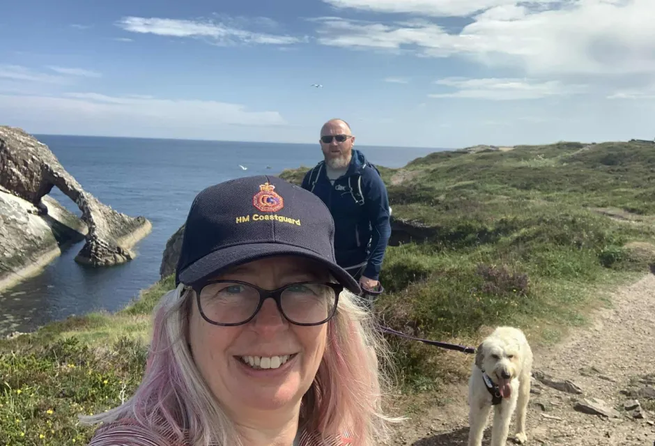 Kate McManus Coyle with her husband Gary and dog Arwen.